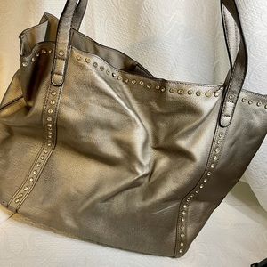 Silver bag. Leather with rhinestone detail. Never used.